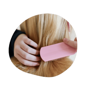 blond woman brushing her hair